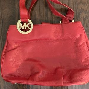 MK red leather shoulder bag